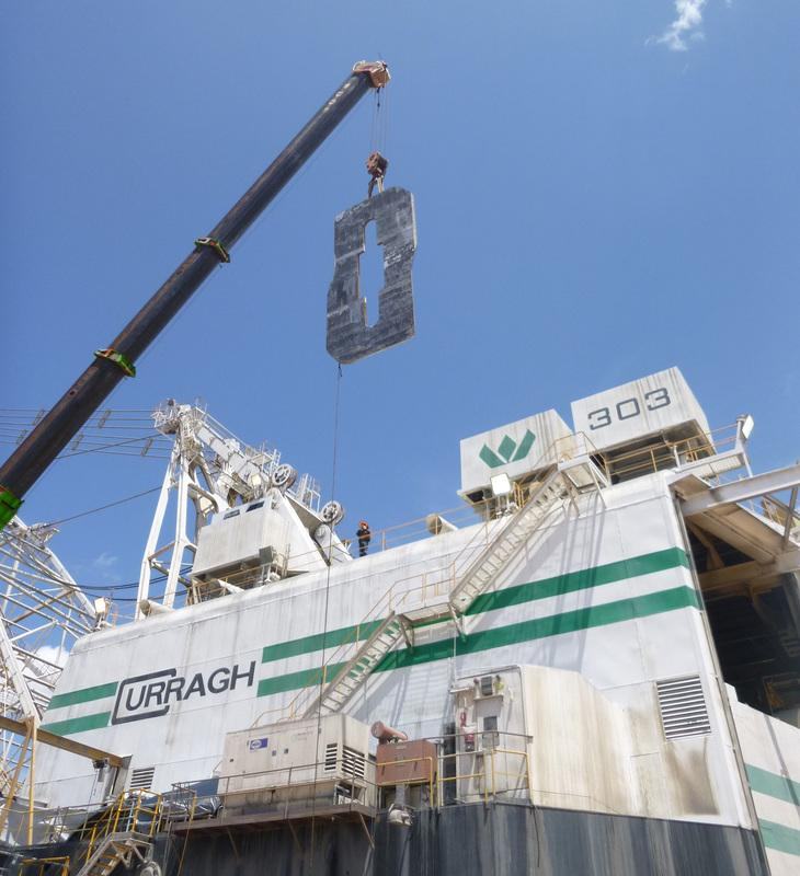 Mobile crane lifting a large component on the Curragh mine dragline